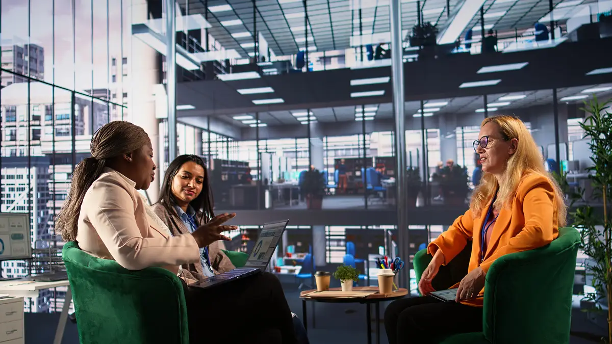 Multiethnic leaders in a business meeting brainstorming growth strategy